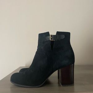 Adorable black suede booties.